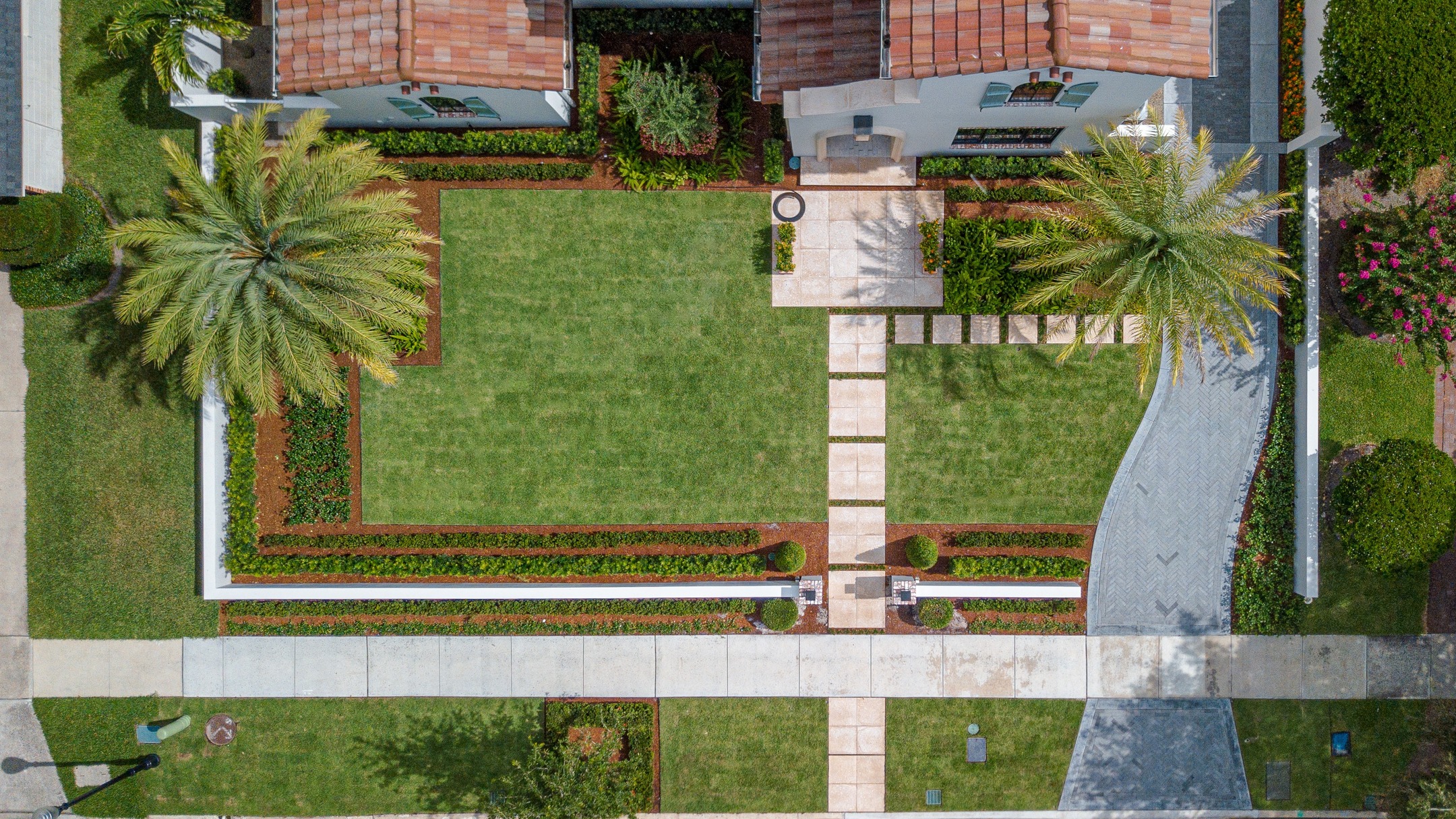 Aerial drone view of luxury landscape design with formal gardens